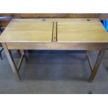 A Vintage Pine Double Seated School Desk, with lift up top, approx 69 x 45 x 102 cms.