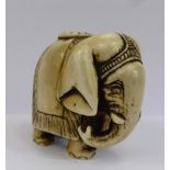 A Meiji Period Japanese Ivory Netsuke, depicting an Asian elephant, approx 4 x 4 cms, no character