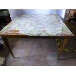 A Marble and Brass Coffee Table, with removable legs.