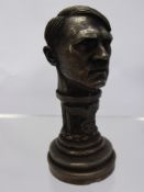 A Bronze Seal depicting the head of Hitler, approx 8 cms in height.