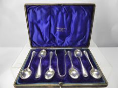 A Set of Six Silver Coffee Spoons and Sugar Nips, Chester hallmarkl dd 1907, mm Walker & Hall,