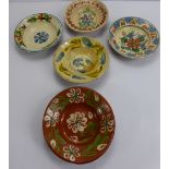 Five Antique Hungarian Peasant Pottery Bowls, hand painted with floral design.