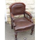 A Mahogany and Leather Smoker's Chair, on turned legs.