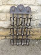 A Vintage Wrought Iron Metal 12 Bottle Wine Rack.