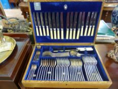 An Oak Cased Mappin & Webb Flatware, six place settings No. 705969.