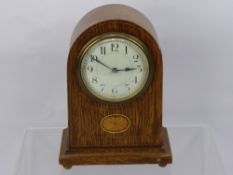 A French SFRA Oak Cased Mantel Clock, with decorative inlay, enamel dial, approx 22 cms