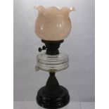 A Victorian Duplex Oil Lamp, with decorative pink glass shade approx 49 cms high, together with a
