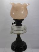 A Victorian Duplex Oil Lamp, with decorative pink glass shade approx 49 cms high, together with a