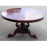 A Victorian Style Mahogany Circular Dining Table, with ornately carved pedestal base, approx 140 dia