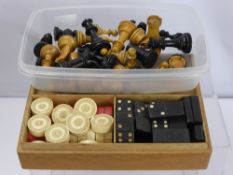 A Miscellaneous Collection of Games, including antique bone draughts pieces, (15 red, 15 white),