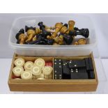 A Miscellaneous Collection of Games, including antique bone draughts pieces, (15 red, 15 white),