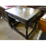 An Antique Mahogany Occasional Table, with decorative carving and pie crust edge, on turned legs