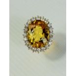 An Exquisite 15.05 ct Golden Yellow Heliodor and Diamond Ring set in an 18 ct Yellow and White