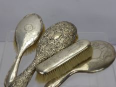 A Silver Dressing Table Set, London hallmark, mirror and clothes brush, together with a hair brush