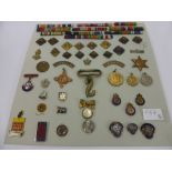 A Quantity of Military Medals and Buttons, including British Legion, Red Cross, National Savings,