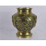 An Antique Chinese Brass Vase, with raised decoration depicting flowers, birds and tigers, character