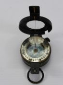 A WWI Compass, marked T.G. Co. Ltd., London, NEB 34128, 1940 MK III, liquid intact.
