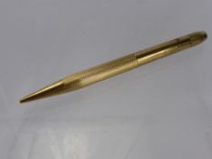 A 9 Ct Gold Propelling Pencil, Birmingham hallmark, mm Cohen & Charles.