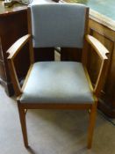 A Gordon Russell Oak Carver Chair, with Gordon Russell stamp to seat.