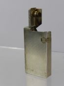 A Solid Silver Vintage Dunhill Lighter, the engine turned lighter initialled D.W.V., London hallmark