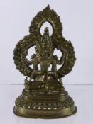 A 19th Century Sino-Tibetan Buddha, seated on a lotus dais, hands clasped in prayer, approx 16 cms