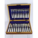 A Set of Silver and Mother of Pearl Fruit Knives and Forks, in the original box, Sheffield hallmark,
