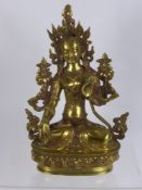 A Contemporary Brass Figure of Deity, sitting on a lotus form base, the deity with right palm raised