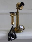 A Vintage Style Brass Telephone on Stand.