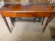 A Victorian Mahogany Serving Table, supported on tuned legs with castors, approx 107 x 36 x 72 cms