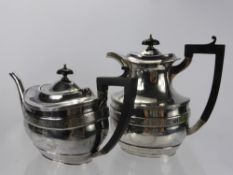 A Silver Coffee and Tea Pot, Birmingham hallmark, the teapot dated 1917 and the coffee pot dated