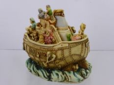 A Harmony Kingdom Model of a Boat, depicting various characters, together with Harmony Kingdom Sin