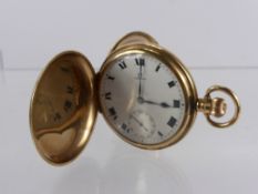 A Gentleman's 9 Ct Gold Omega Full Hunter Self Wind Pocket Watch, the watch having white enamel face