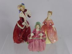 Three Royal Doulton Figures, including "Christmas" HM1992, "Bo Peep" HM1811 and "Debbie" HM2400. (