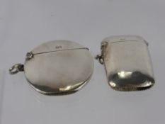 Two Solid Silver Vesta Cases, including one circular Birmingham hallmark dd 1906, mm A & J.Z., and