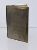 A Silver Gilded Cigarette Case, Chester hallmark, dated 1936, mm E J Trevitt & Son, approx 156 gms.