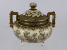 A 19th Century Japanese Porcelain Pot and Cover, with very fine floral decoration depicting peony