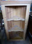 A Contemporary Pine Corner Cabinet, three scalloped shelves, approx 105 x 60 x 31 cms