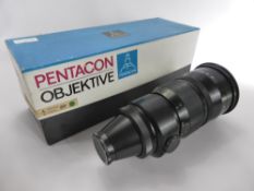 A Pentacon Objektive 4/300 Telephoto Lens, in original box.