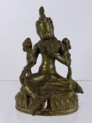 A 19th Century Brass Sino-Tibetan Figure of Buddha, depicted seated on a lotus dias, hand raised