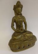 A 19th Century Brass Sino-Tibetan Figure, depicting Buddha seated on a lotus dias in a contemplative