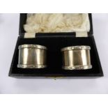 A Pair of Silver Napkin Rings, Birmingham hallmark, mm W.H. Manton Ltd., dd 1967 in the original box