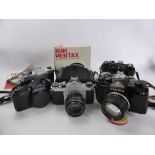 A Miscellaneous Collection of Vintage 35 mm Cameras, Lenses and Accessories, including Asahi