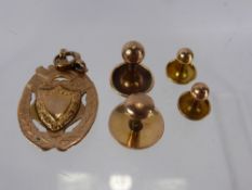 A 9 Ct Solid Gold Medallion, mm C.E. & F.D., Ltd., dd 1909 together with four 9 ct gold dress studs,