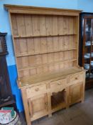 Vintage Pine Dresser, three shelves to the top, three shelves below and two cupboards beneath,