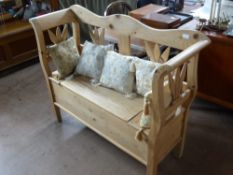 A Vintage Pine Window Seat, with hinged lid for storage, approx 124 x 39 x 93 cms.