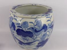 A Blue and White Jardiniere, depicting water lily and birds, approx 30 x 36cms.