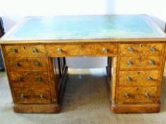 A Victorian Solid Walnut and Rosewood Partner's Desk, the desk having to one side single drawer with