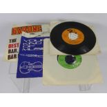 A Miscellaneous Collection of 45 rpm Records, including The Beatles, Parlophone "She Loves You".