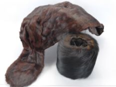 A Mink Stole, together with a fur muff in the original box. (2)