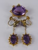 An Antique 15 ct Yellow Gold Amethyst Brooch, 19 x 14 mm (two drill holes) together with a pair of